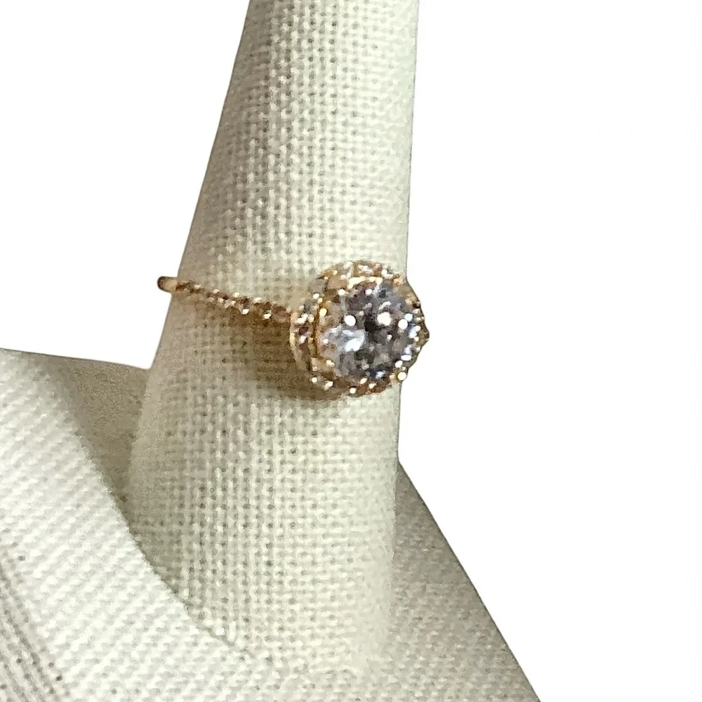 Round Clear Stone Set in Gold Tone Band Mini Side Stone Detailing Size 8.75